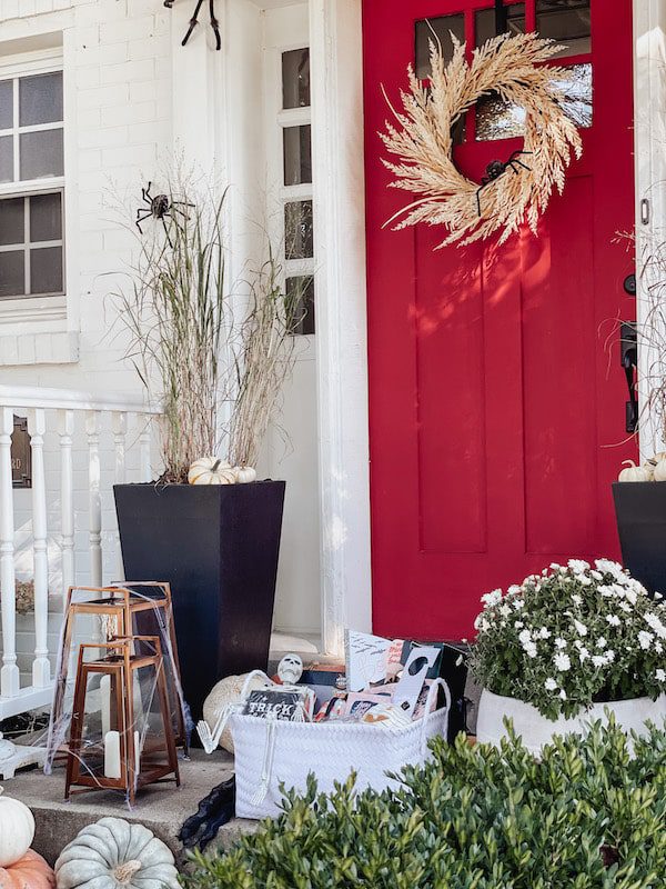front porch with boo basket